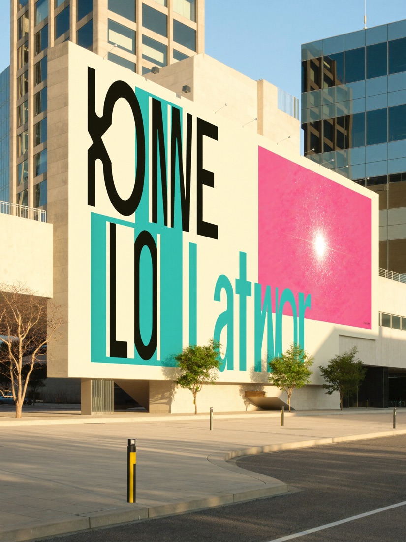 Brand launch campaign on a city billboard — oversized type with teal and pink blocks and a sparkle